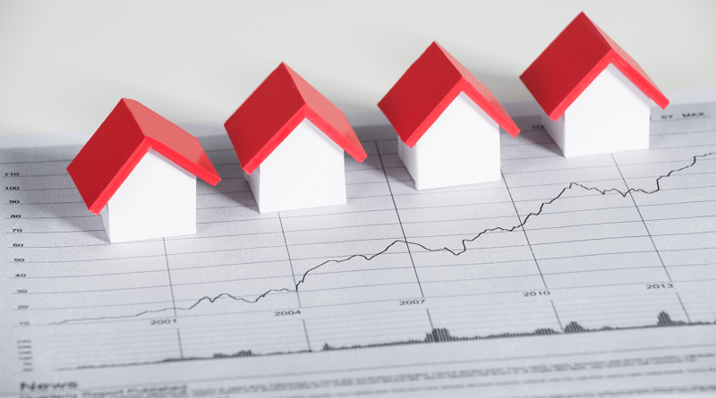 Image of various models of houses lined up a graph that is increasing each month to support housing market article