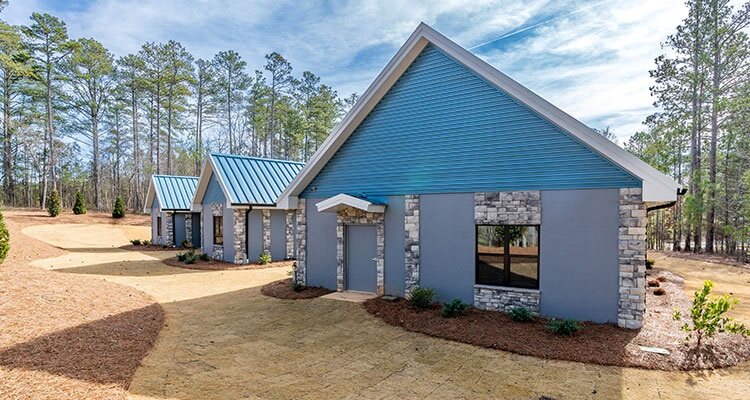 Concrete built homes in woodland setting