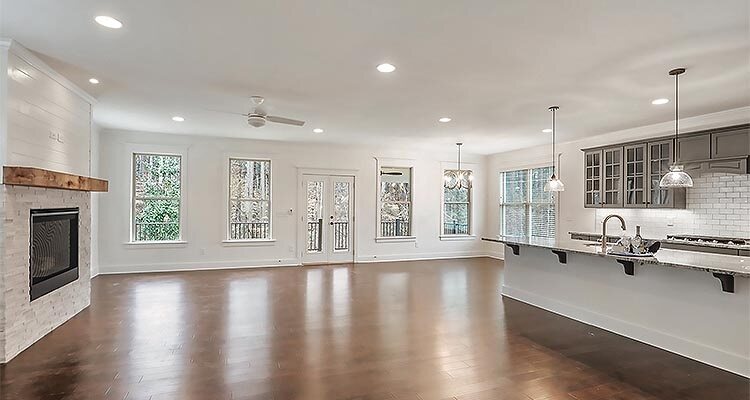 Empty modern kitchen with wooden floor