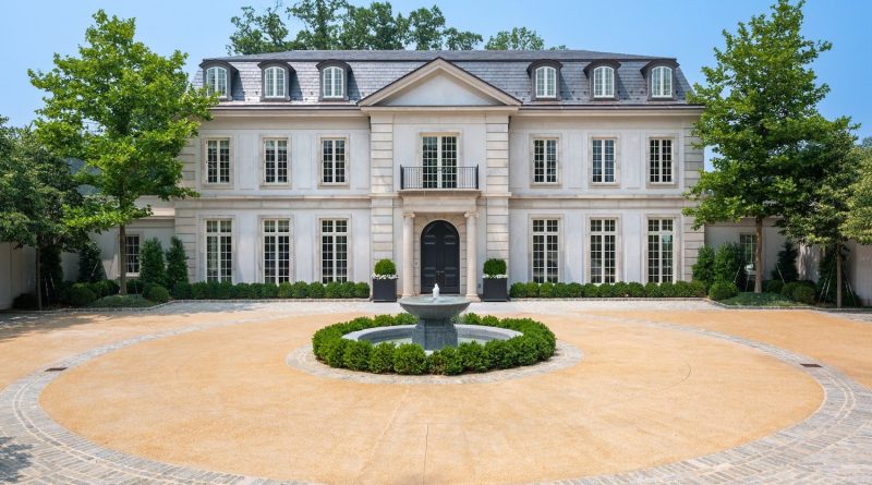 Washington D.C. luxury mansion surrounded by early spring trees, symbolizing political power and real estate value.