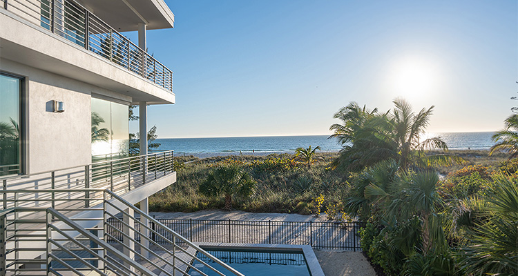 Multi storey beachfront property with a pool
