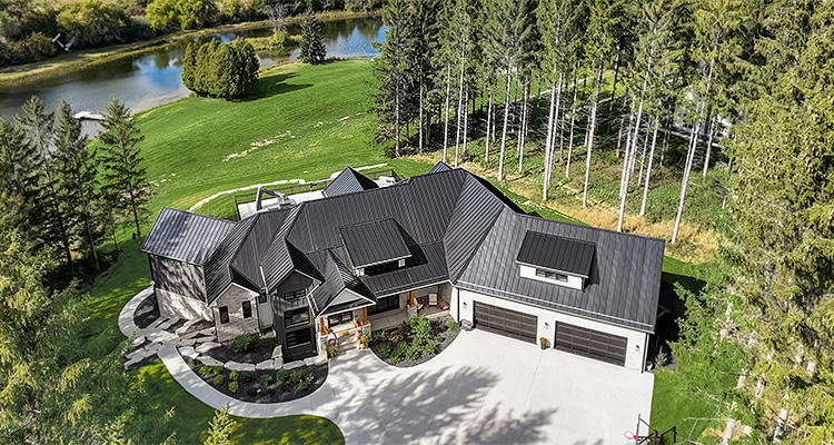 a real estate listing for a custom-built country bungalow on 2.5 acres. The property is located at 274097 Haven's Gate E, Rural Foothills County