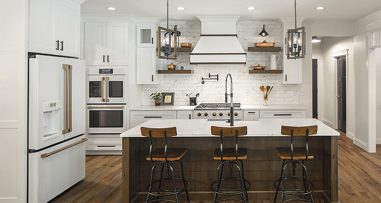 Exquisite custom cabinetry is the hallmark of this kitchen design from Covered Bridge Cabinetry
