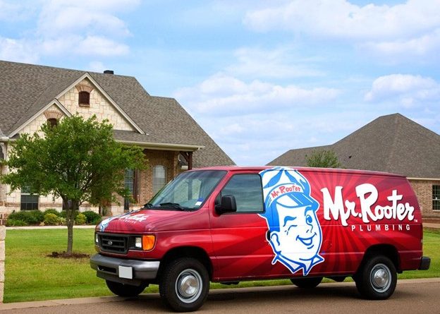 Mr. Rooter of Greater Syracuse van driving through estate