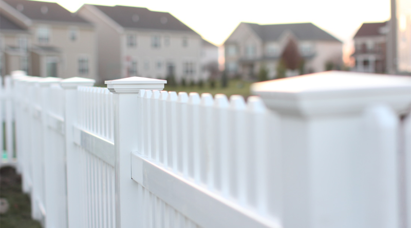 White picket fence by Cedar Mountain Fence Company