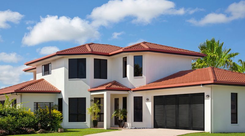 Large modern house in New Jersey with garage door installation by Liberty Door and Awning