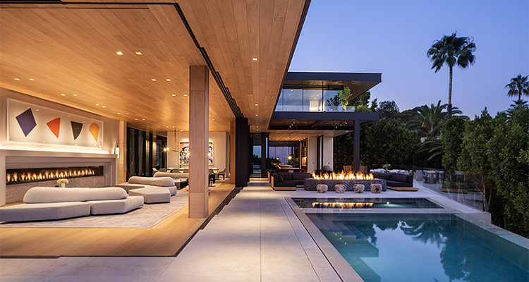 a stunning, modern luxury residence located in the Hollywood Hills, designed to maximize views and integrate indoor and outdoor living spaces.