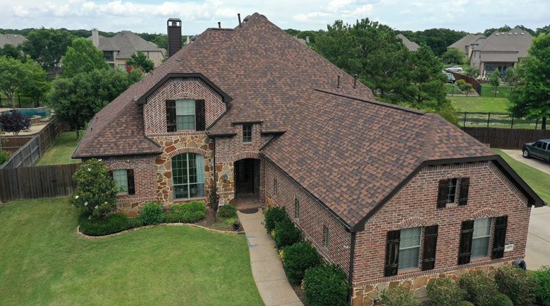 Large luxury house with roof made by Results Roofing