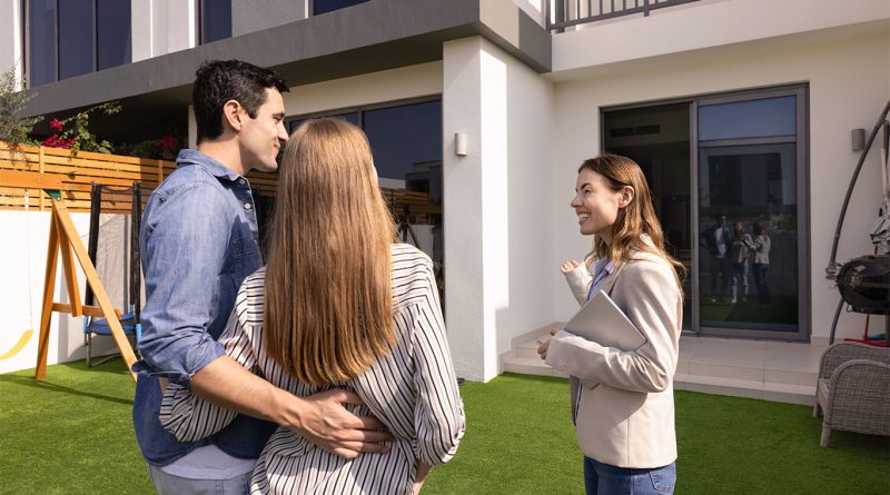 Real estate agent showing a home to an all-cash buyer in a competitive housing market