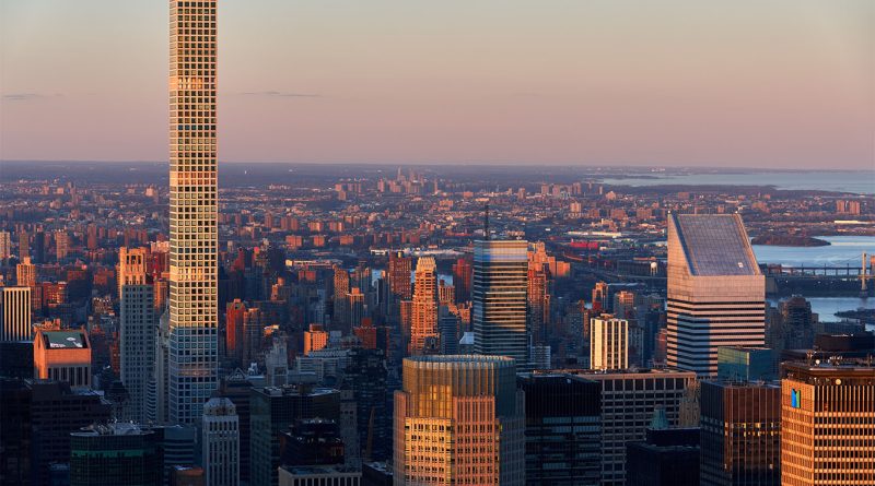 432 Park Avenue skyscraper viewed from Central Park, showing signs of facade deterioration on upper floors