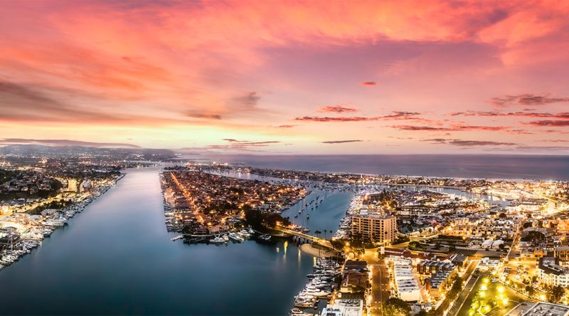 Aerial view of Newport Beach waterfront homes along the Southern California coast