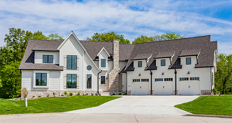 a large, modern suburban house